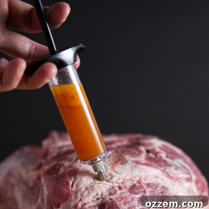 Injection marinade into pork.