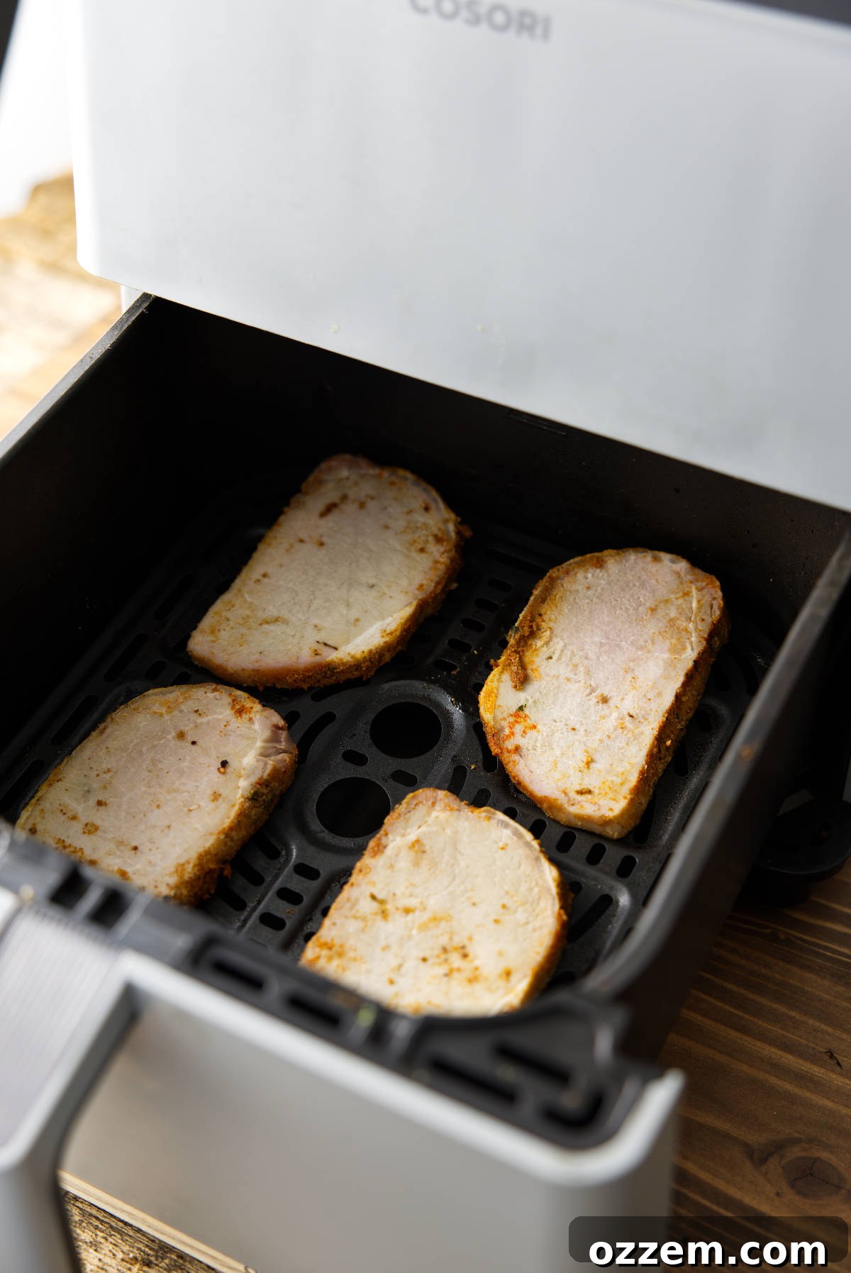 Reheating sliced pork loin in air fryer.