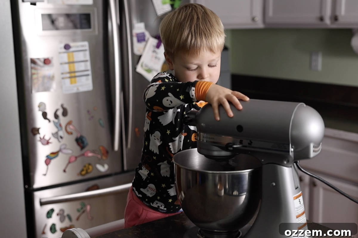 Mixing cake batter in stand mixer.