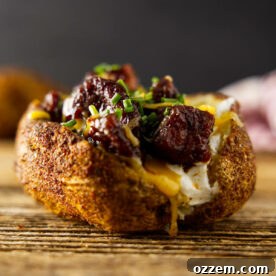 Fully loaded smoked baked potato.