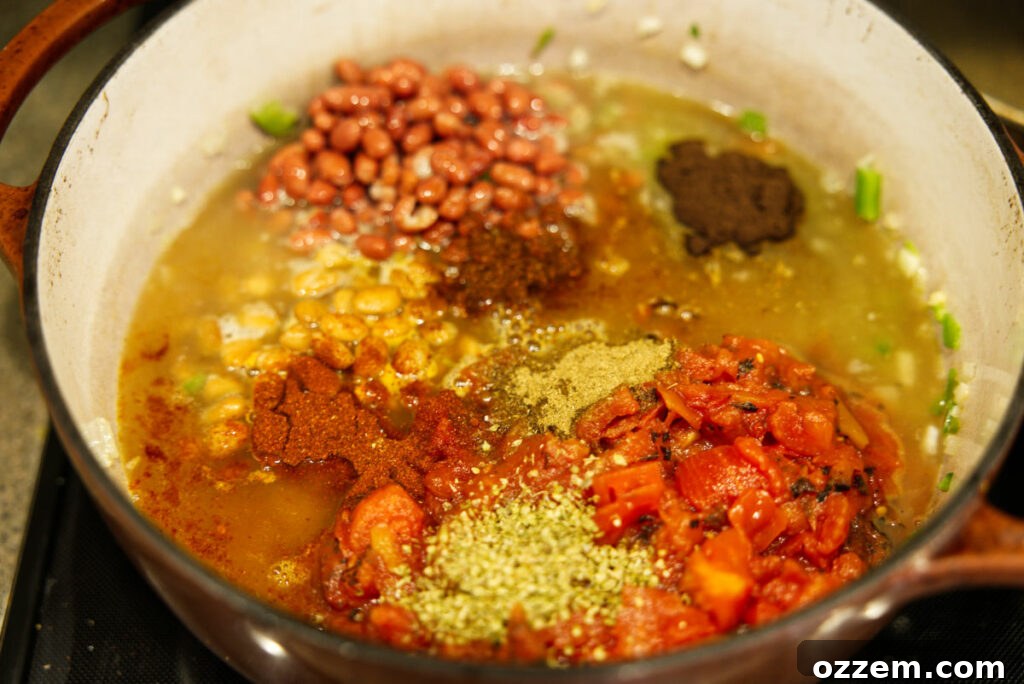 Smoky Leftover Turkey Chili 5 All the ingredients for a turkey chili in a Dutch oven, ready to be mixed together.