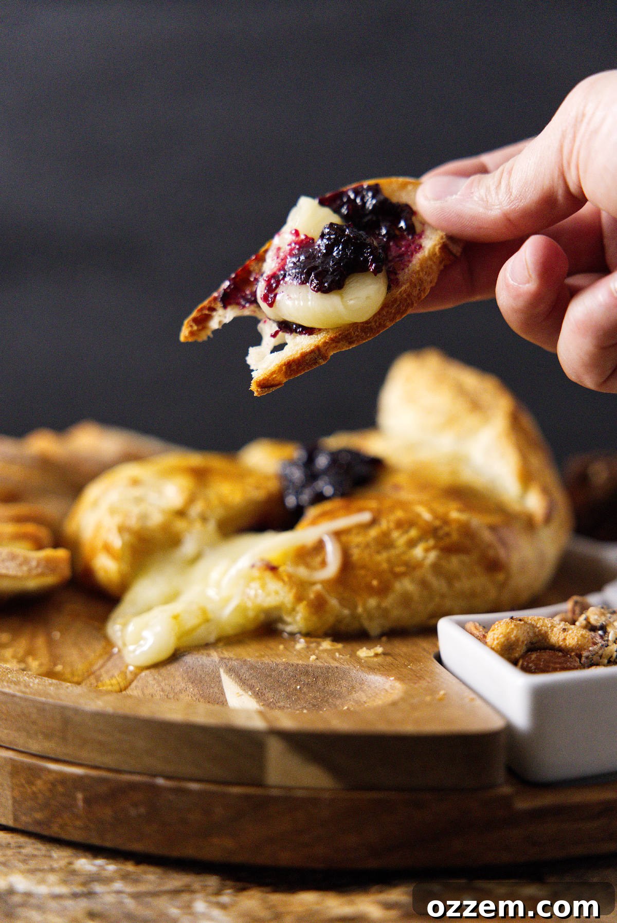 Toast with melted brie cheese and jam, with a perfectly crispy air fryer baked brie underneath.