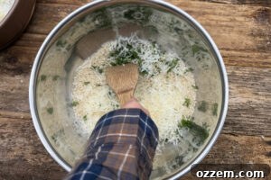 Mixing bread crumb topping in a large mixing bowl.