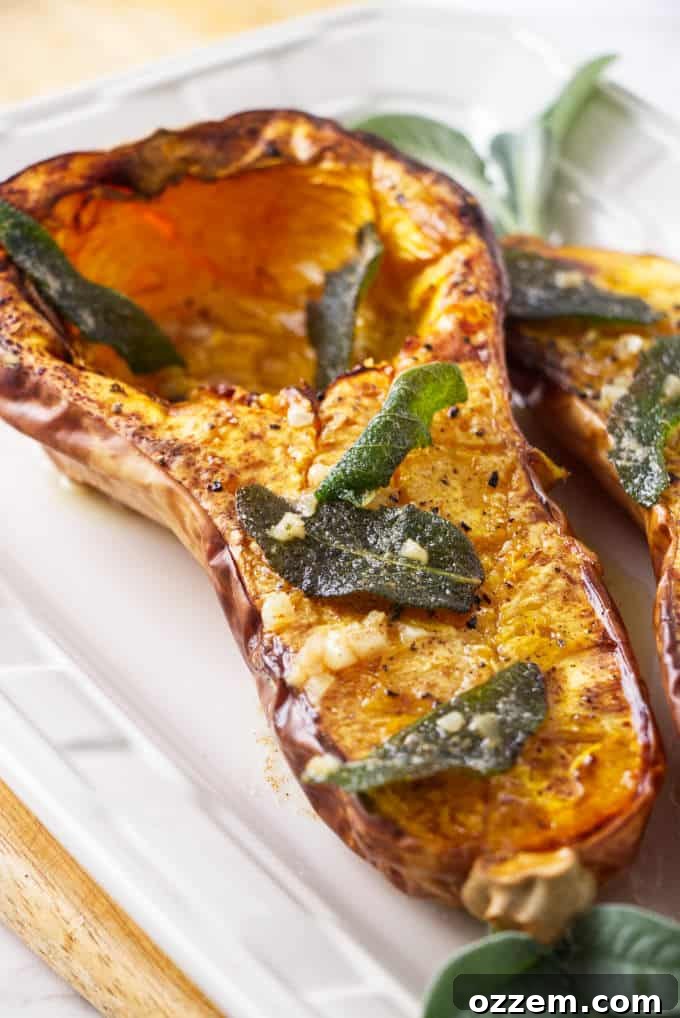 Crispy Air-Fried Butternut Squash with Nutty Sage Butter 6 Air fryer roasted butternut squash with brown butter and sage on top.