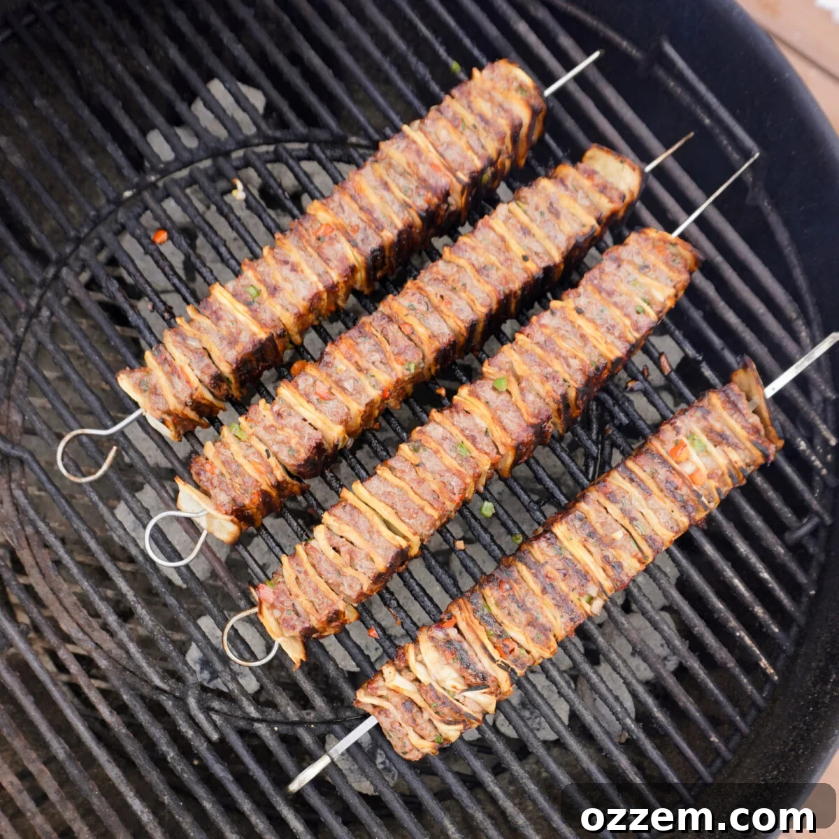 grilled tortilla beef kebabs on the grill.
