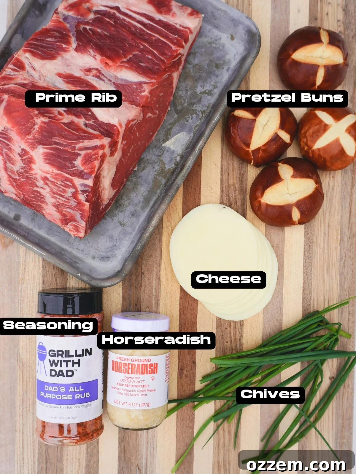 Gourmet Prime Rib Sliders 3 An array of fresh ingredients for making Grilled Prime Rib Sliders, including a seasoned prime rib, buns, cheese, and horseradish cream components.