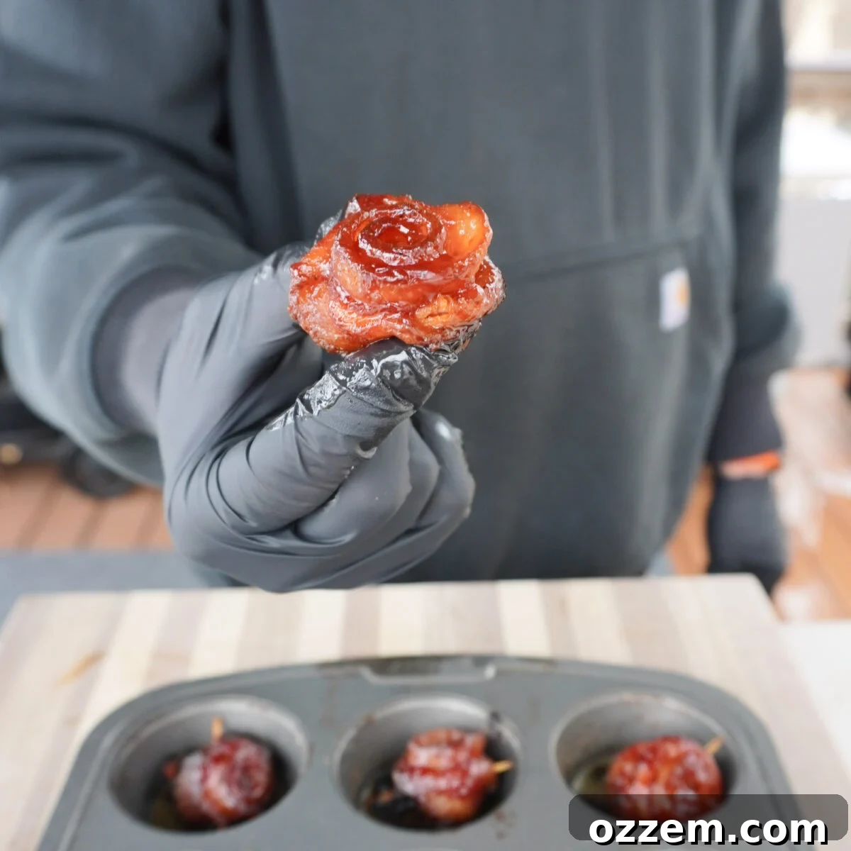 Close-up of perfectly grilled bacon roses, showcasing their crispy texture and detailed 'petals'.