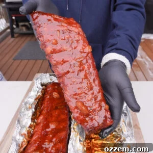 Peach Bourbon Smoked Ribs presented.