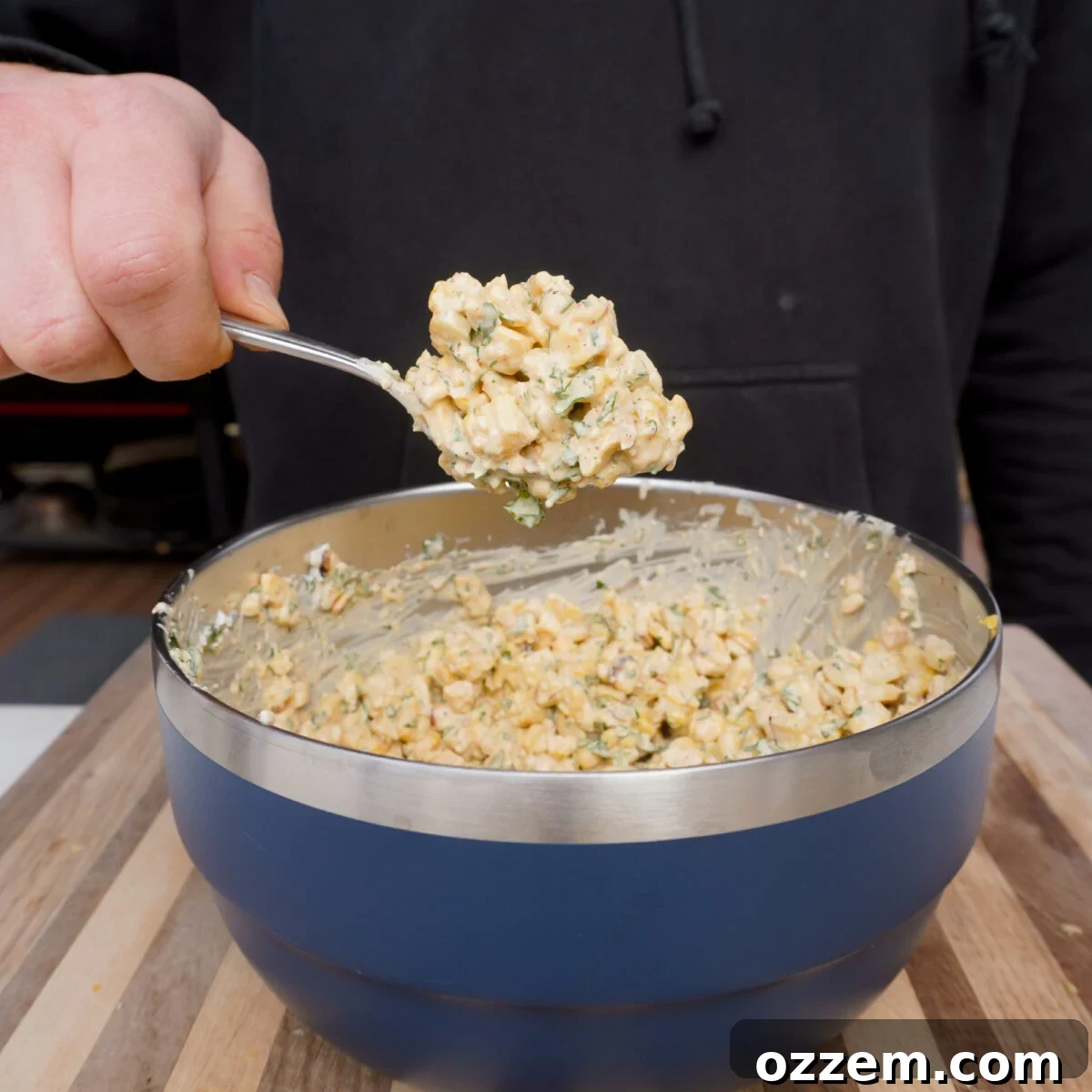 mexican street corn mixed in a bowl.