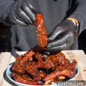 A vibrant image of Chili Crunch Party Ribs, showcasing their appetizing glaze.