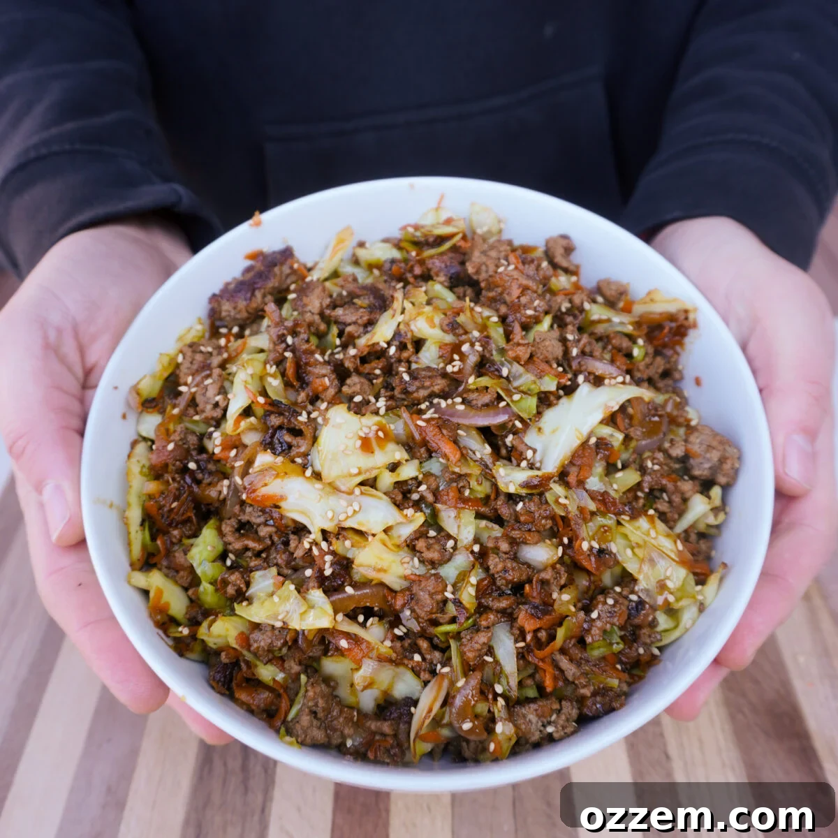 Beef Egg Roll Bowl presented in a serving dish with garnishes.