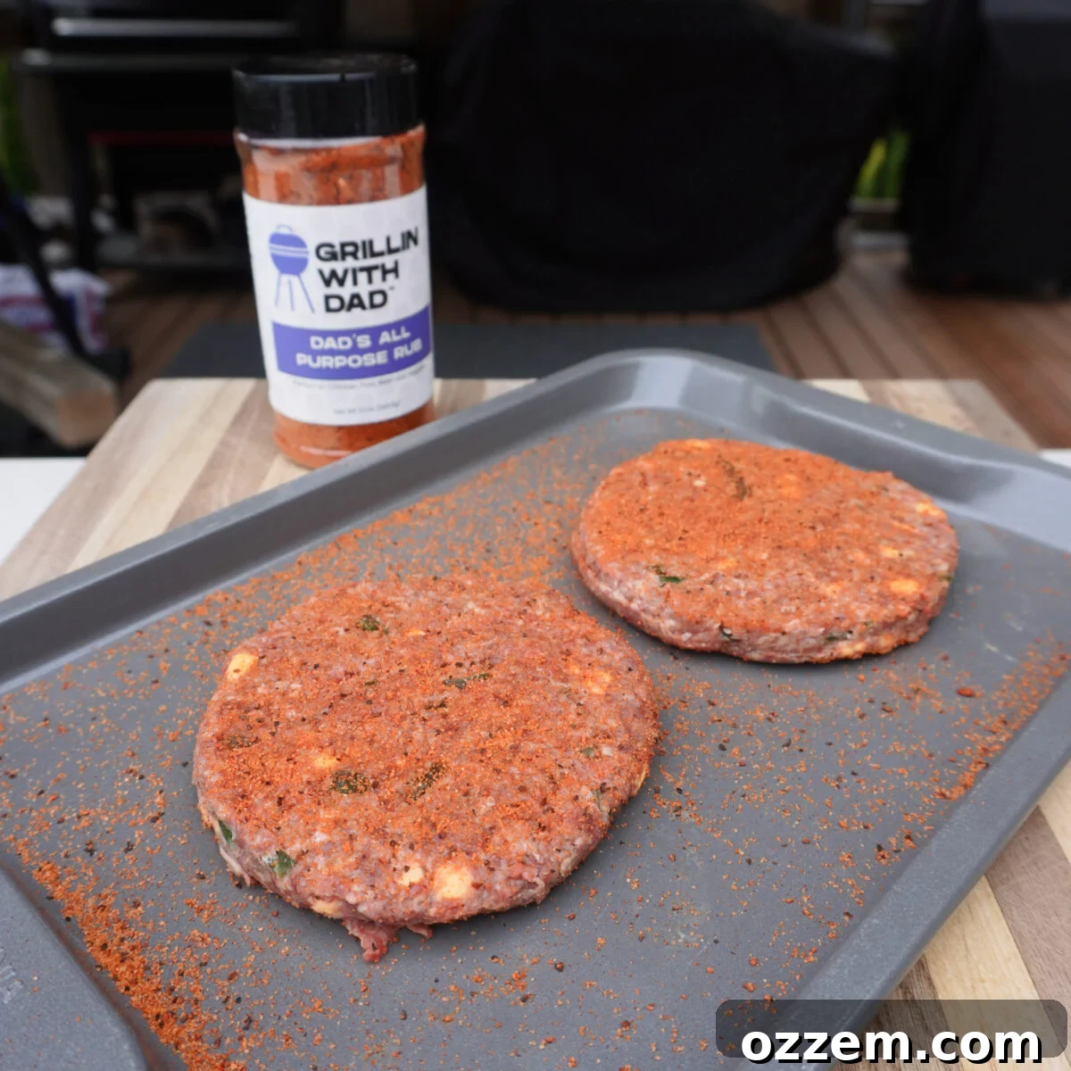 Jalapeño Popper Pub Burger Recipe: Creamy, Crispy, Spicy Bite 4 seasoned beef pub burger patties on tray.