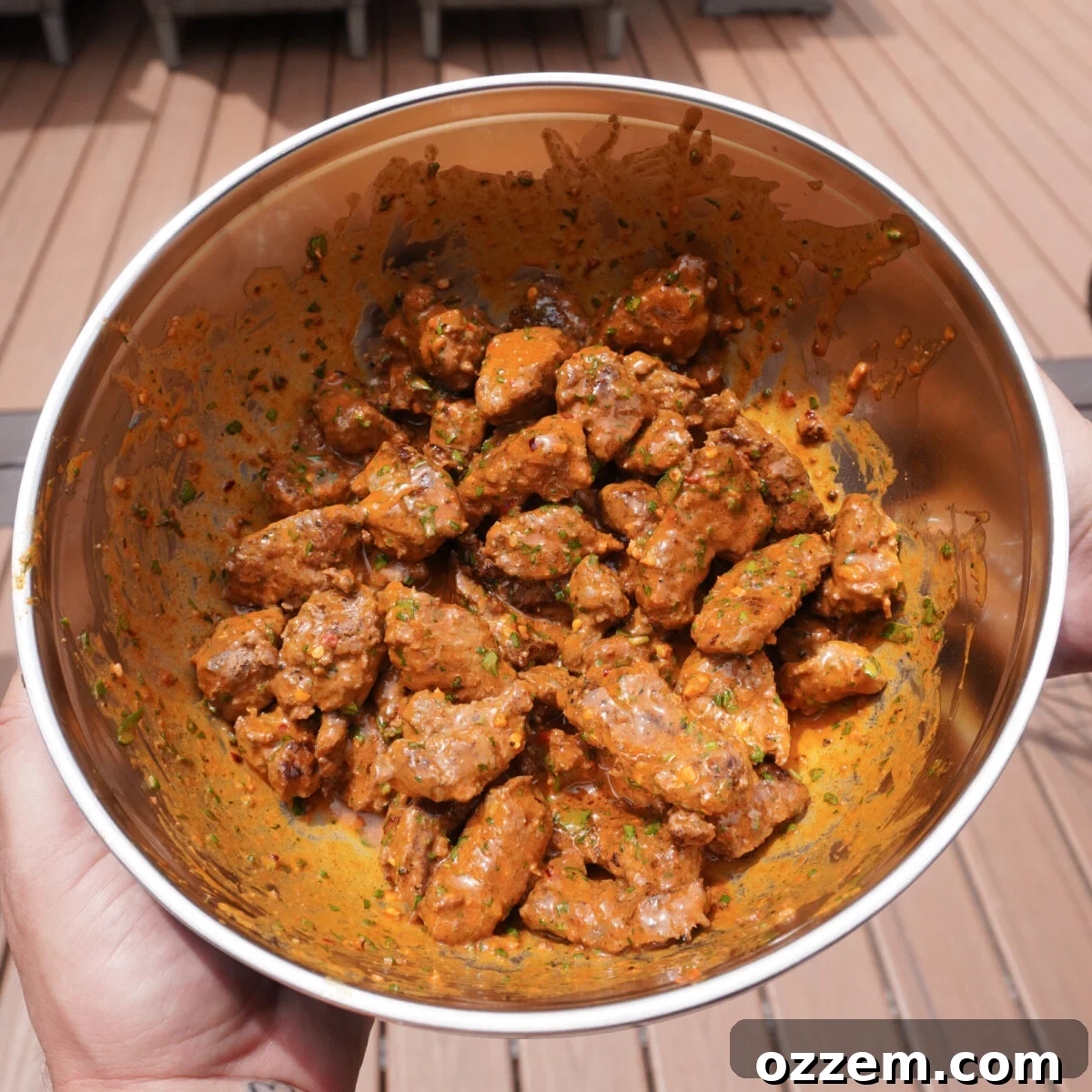 cowboy butter steak bites sauced in a bowl.