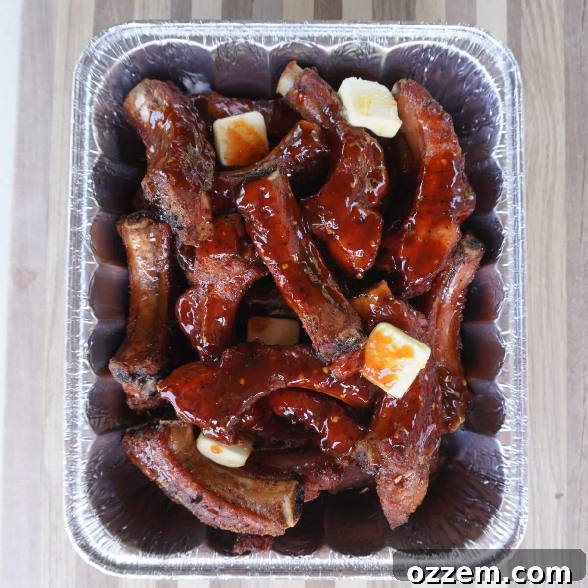 wrapping sweet and spicy party ribs.
