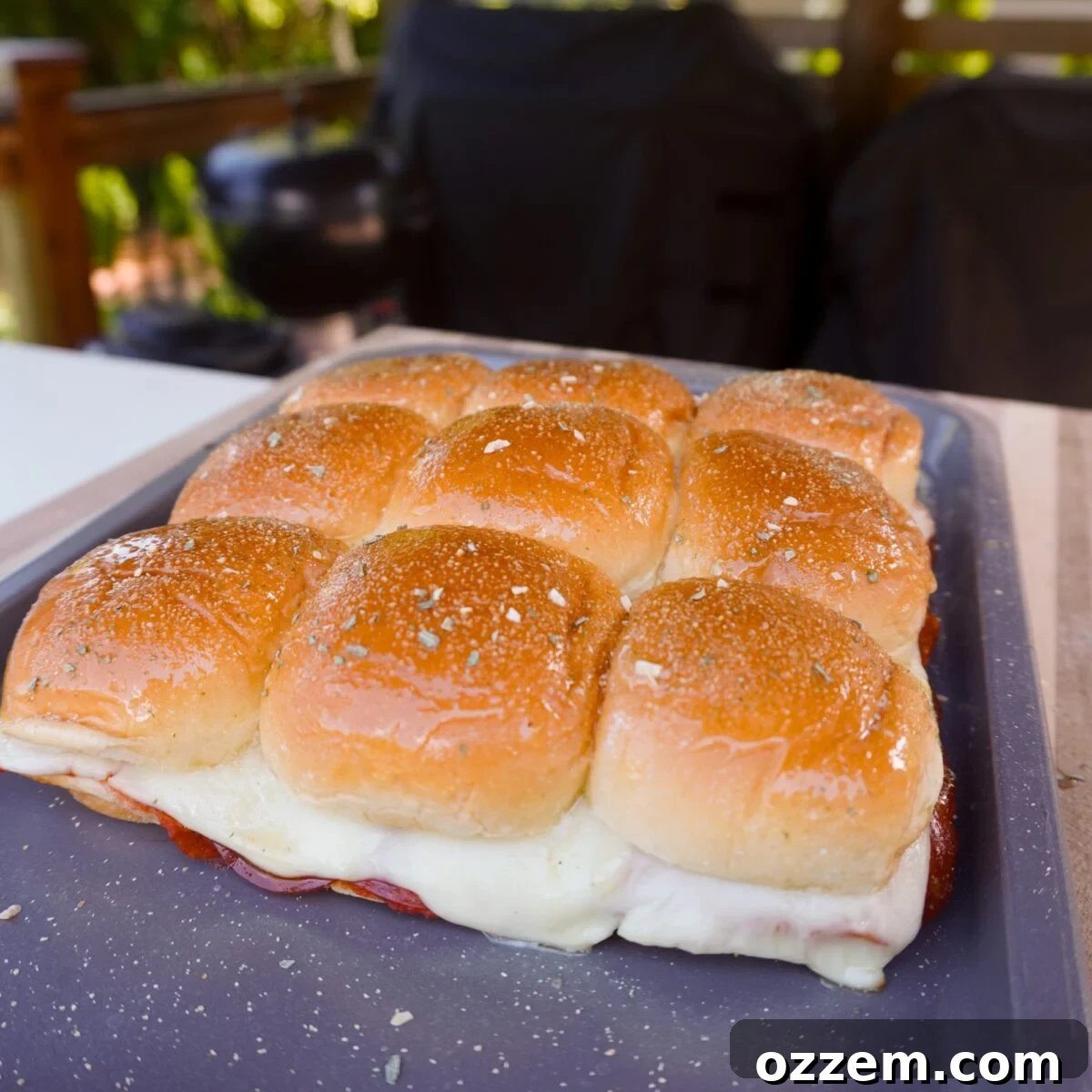 Toasted golden brown slider buns.