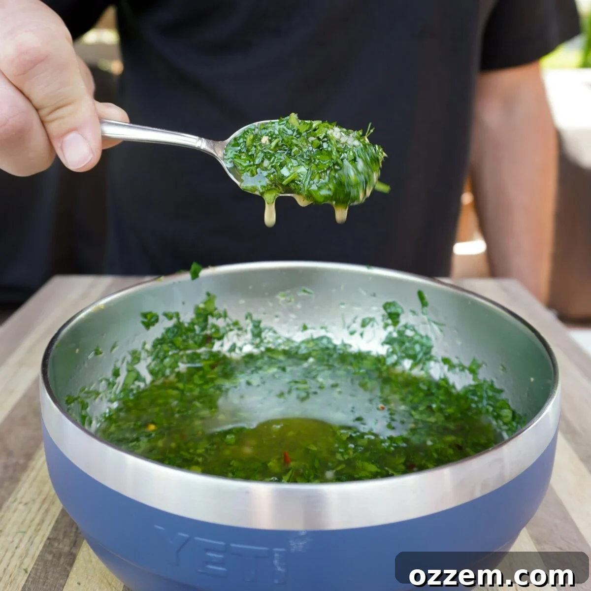 dill chimichurri in a blue bowl.