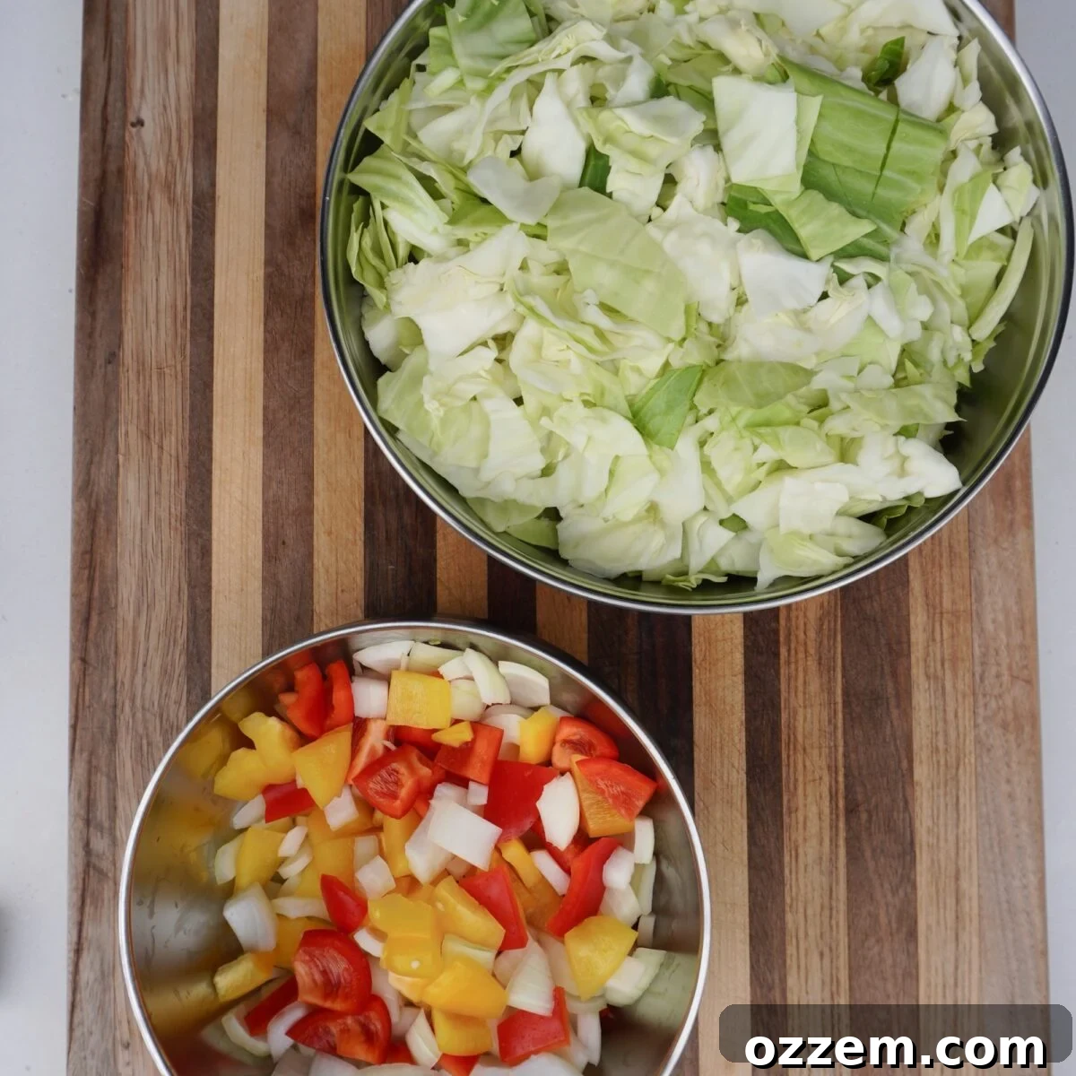 Chopped veggies in bowls.