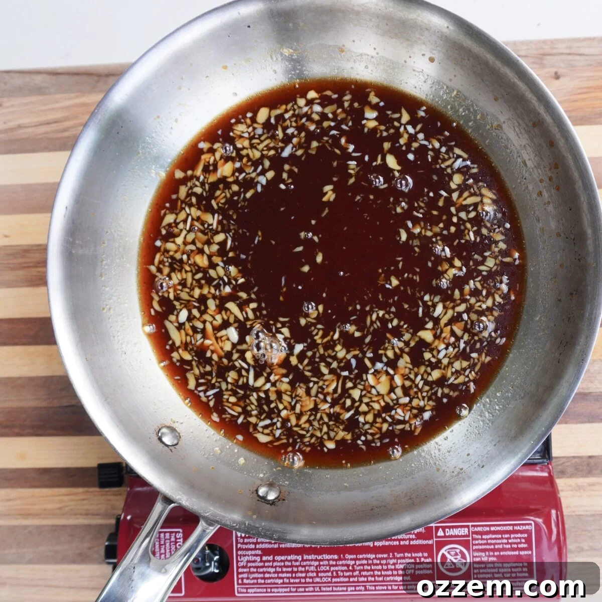 Honey garlic glaze in a saucepan.