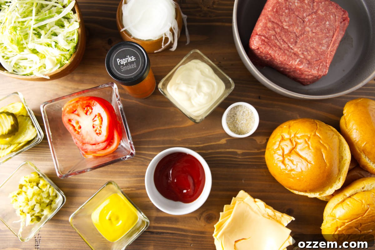 Blackstone Smash Burgers with Perfectly Crispy Edges 4 Ingredients for Blackstone smash burgers arranged before cooking.