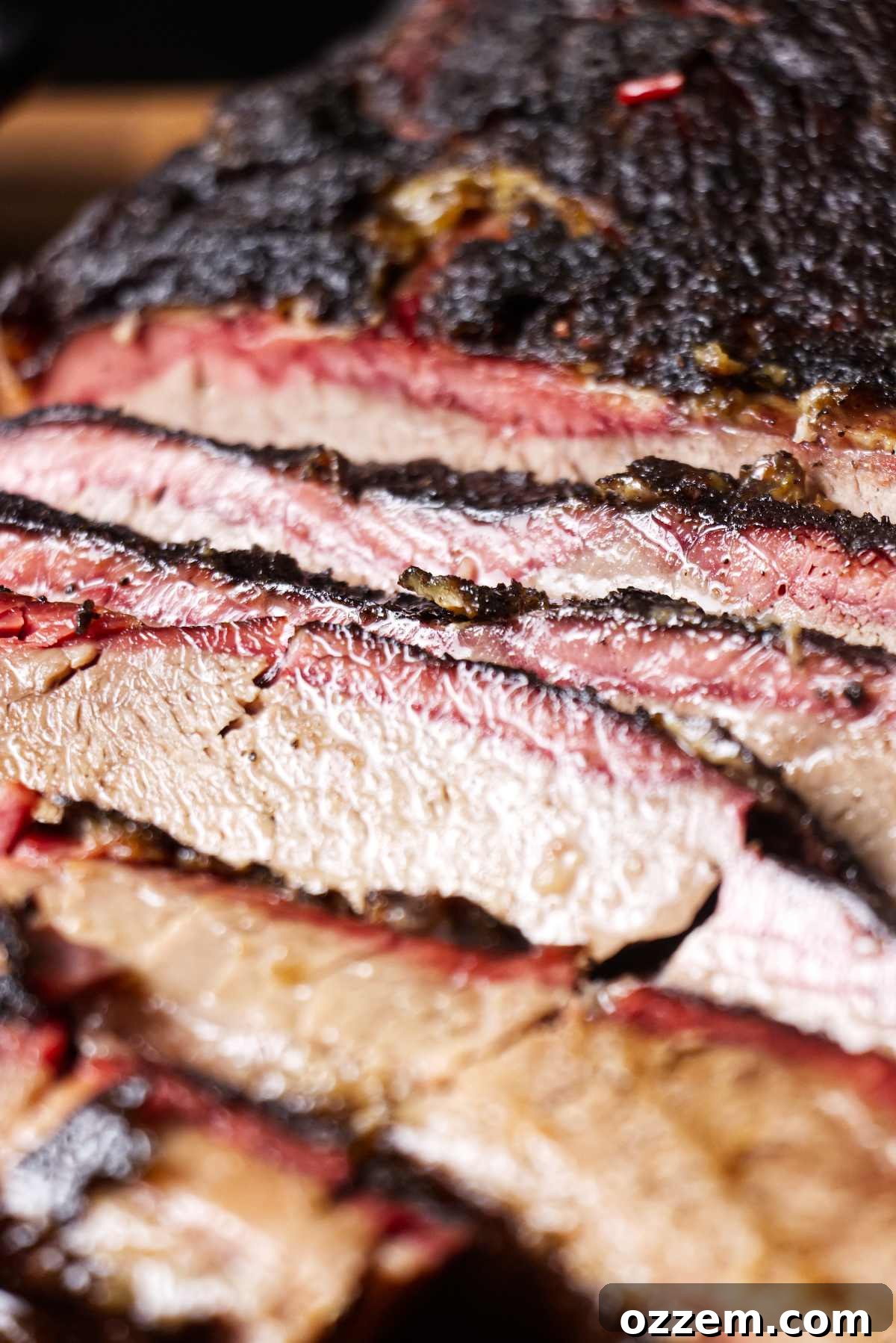 Close up of a smoked brisket showing the smoke rings.