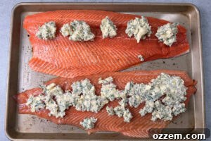 Smoky Pellet Grill Salmon Recipe 11 Dollops of compound butter on top of two fillets of salmon.