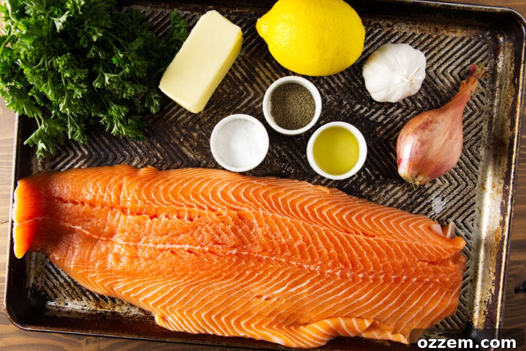 Smoky Pellet Grill Salmon Recipe 4 Ingredients for pellet grill salmon laid out on a baking sheet pan.