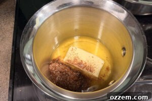 Melting butter with barbecue seasoning for smoked corn on the cob.