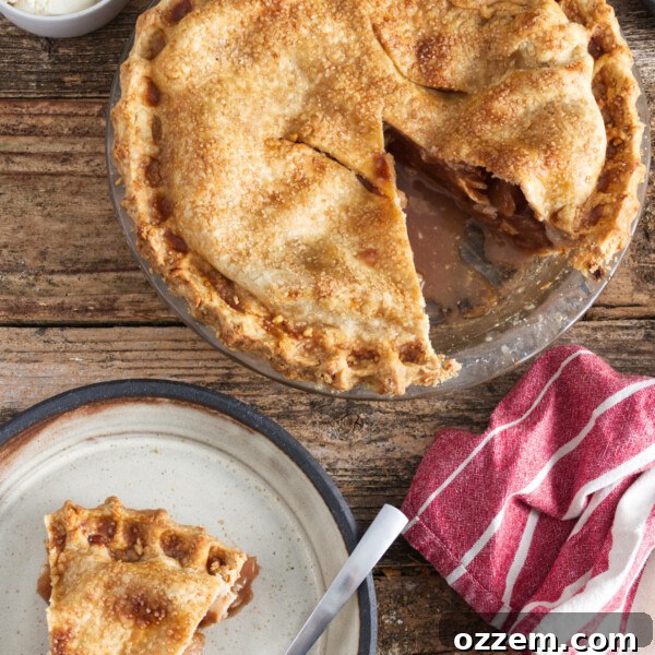 apple pie with slice out of it, slice of apple pie on plate, bowl with three scoops of vanilla ice cream