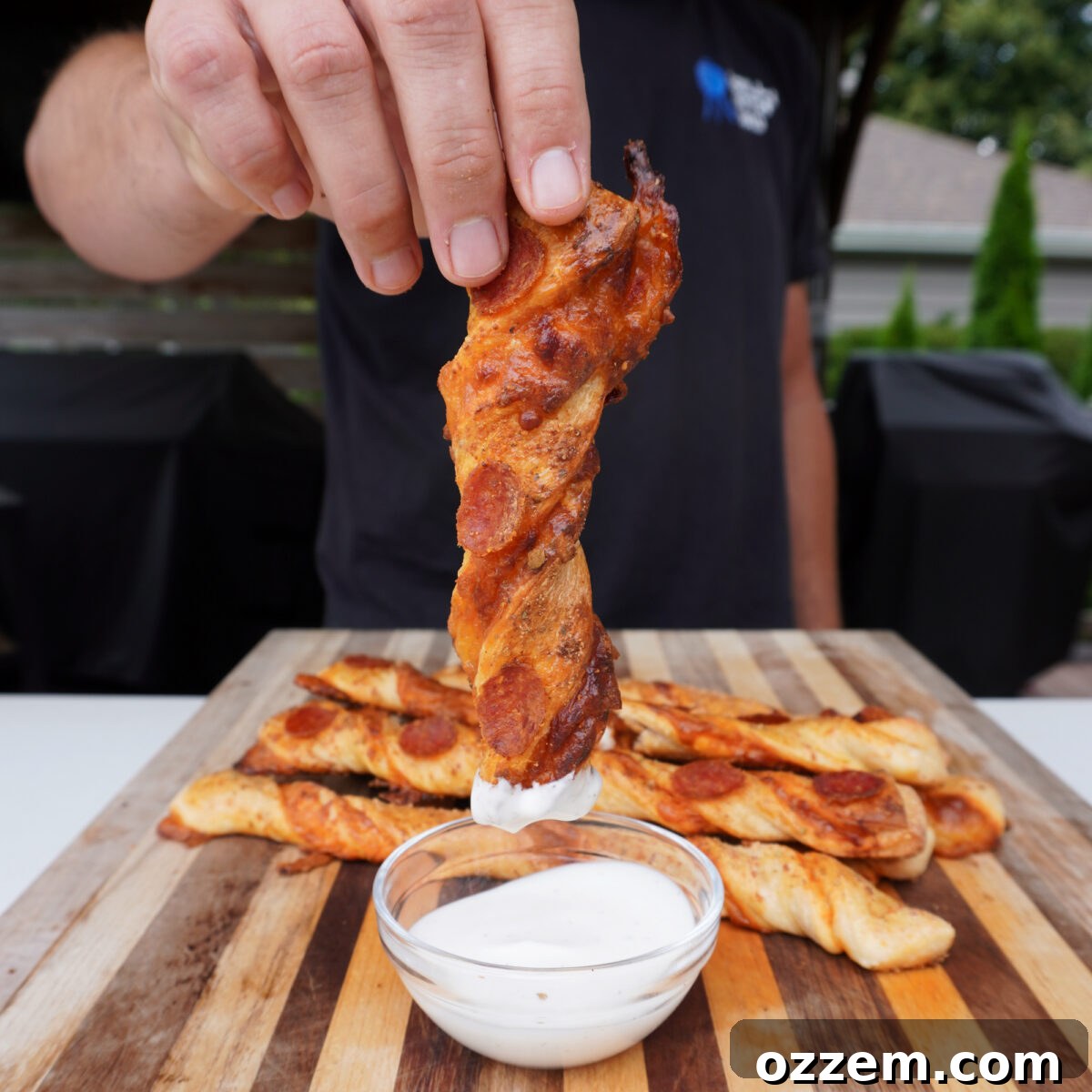 Homemade Cheesy Pizza Twist Sticks 8 Pizza Twist dipped in ranch dressing.